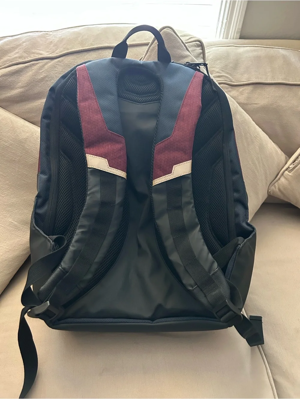 Superhero-Inspired Red and Black Backpack with Yellow Accent